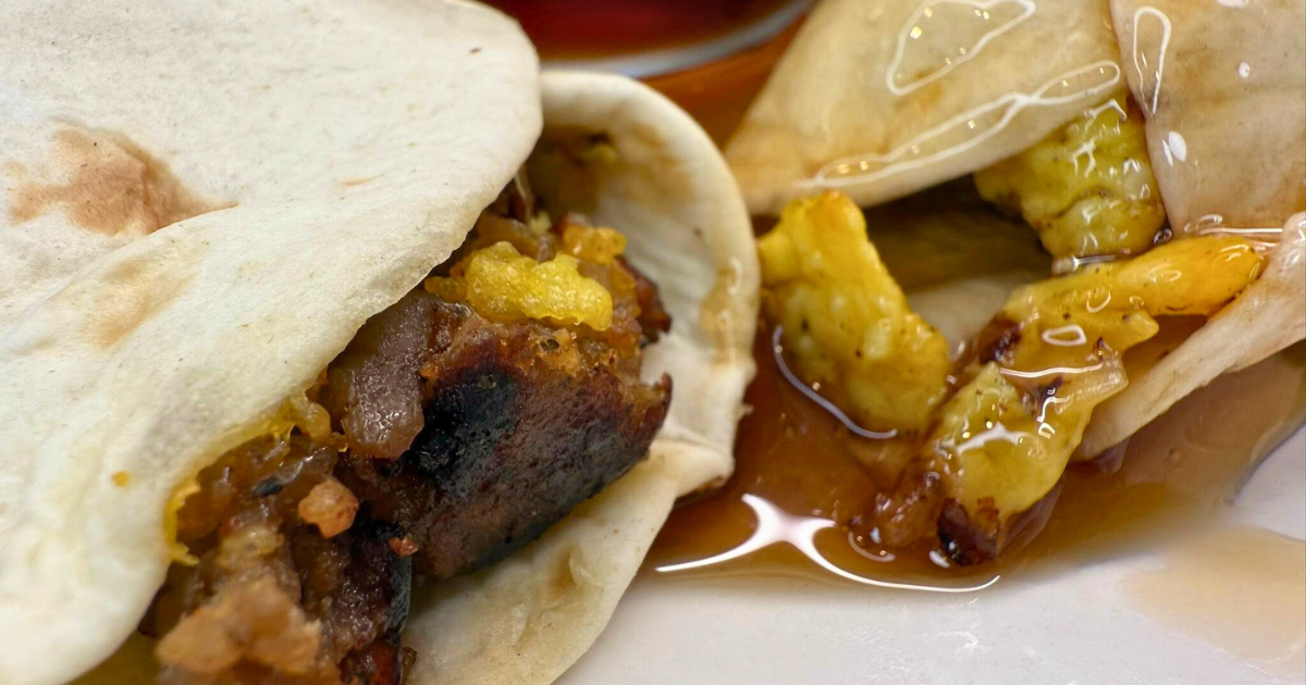 Homemade Sausage, Egg, and Cheese Breakfast Burritos with syrup
